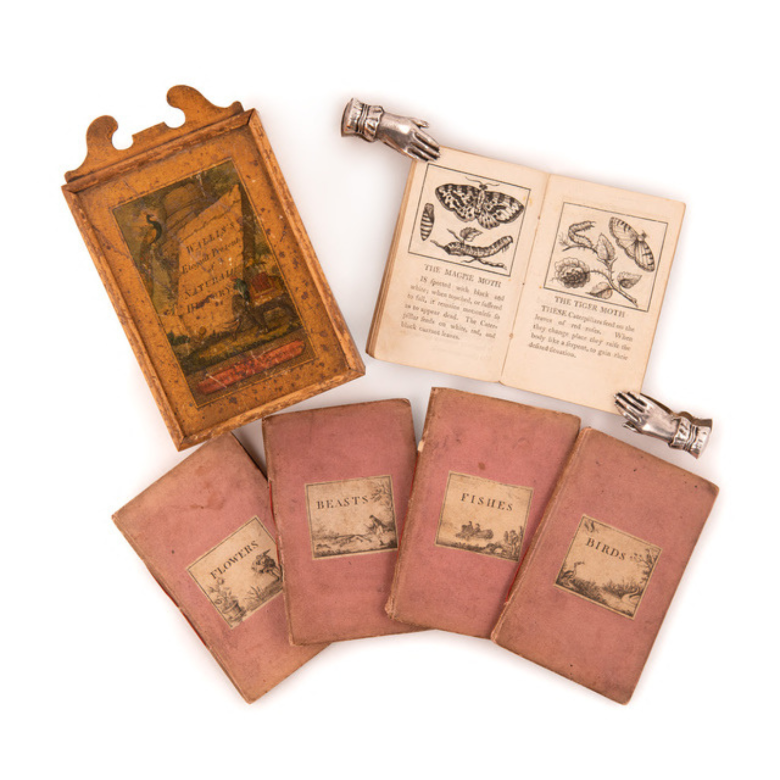 Vintage collection of illustrated books and a decorative box