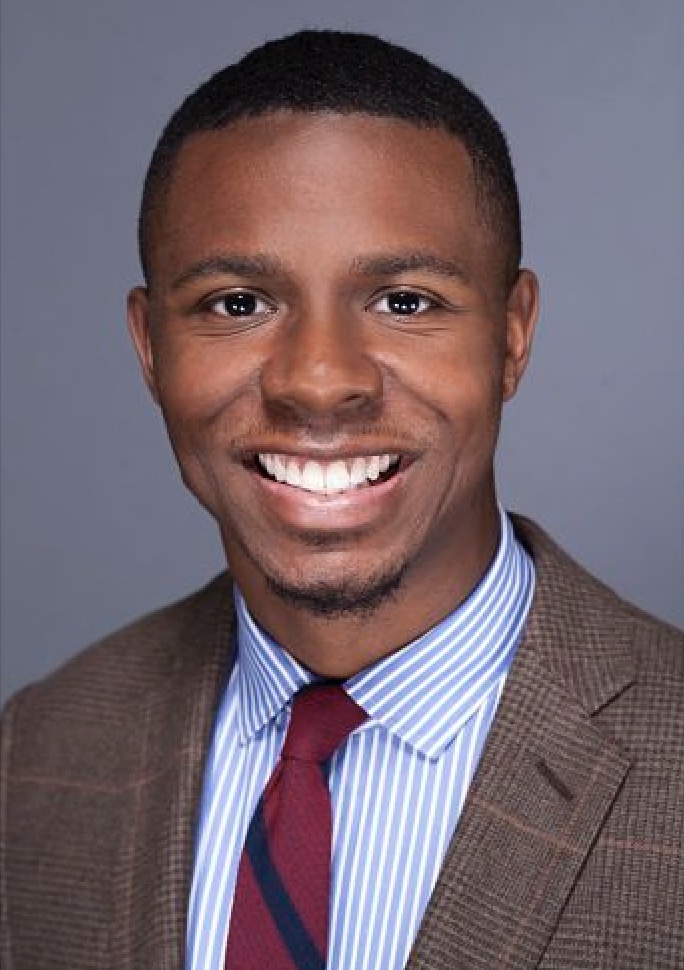 Professional headshot of Jordan Dean Ross