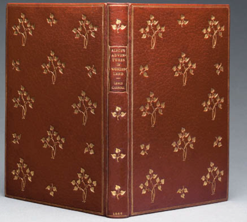 Brown leather-bound book titled 